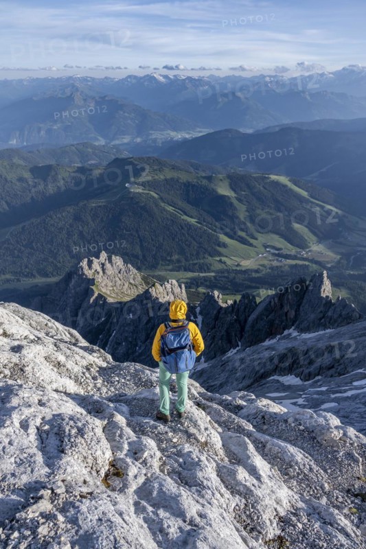 Hiker Looking down into the valley from the Hochkönig, Salzburger Land, Austria, Europe