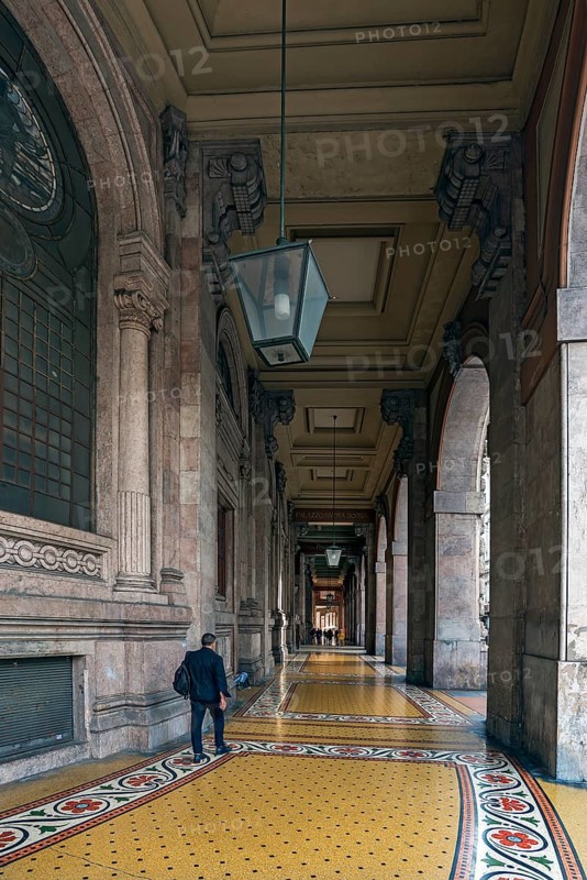 Arcaded walkway with mosaic floor from Palazzo della Borsa, built between 1907 and 1912, in Piazza de Ferrari, Genoa, Italy, Europe