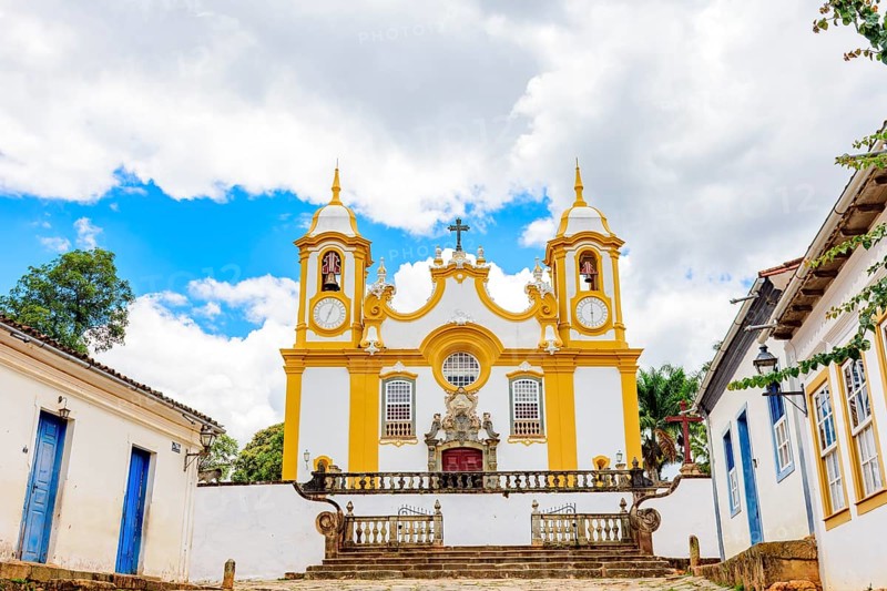 Houses and historic church in an old cobbled street in the famous city of Tiradentes in Minas Gerais, Brasil