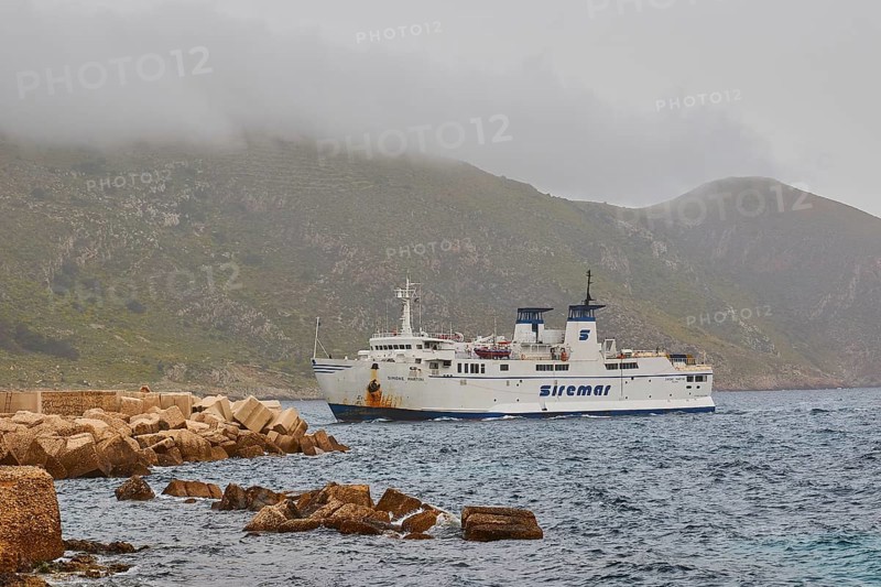 Fog, bad weather, Siremar car ferry, concrete breakwater, Favignana town, main town, Favignana, Egadi Islands, Sicily, Italy, Europe