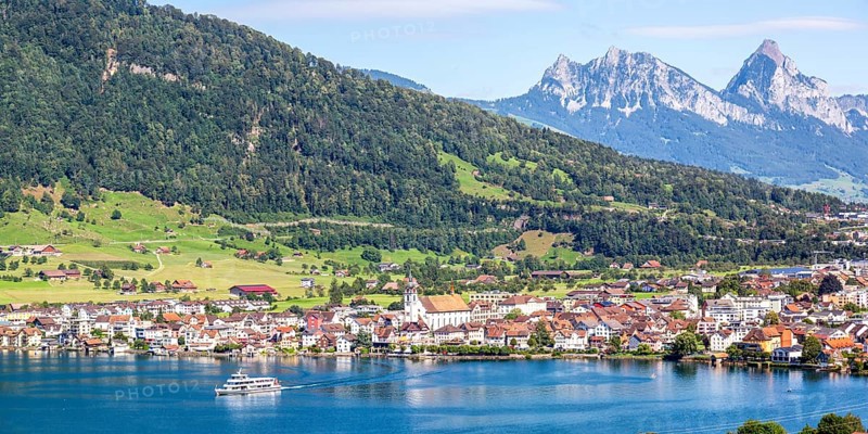 View of Arth on Lake Zug and mountains in the Swiss Alps with panorama of the Little and Great Mythen in Arth, Switzerland, Europe