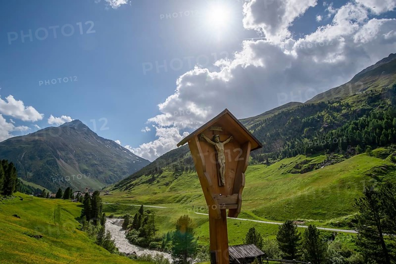 Jesus on the cross against the backdrop of the Alps, Vent, Ötztal, Tyrol, Austria, Europe