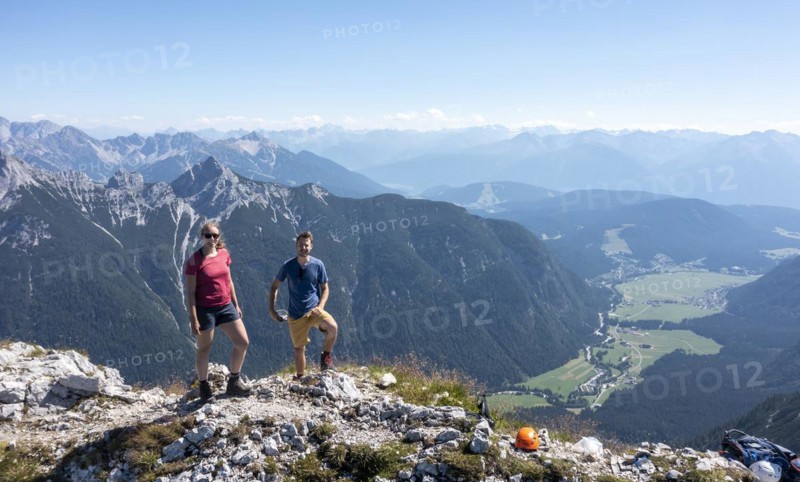 Hiker at the Westliche Wettersteinspitze, Wetterstein Mountains, Bavaria, Germany, Europe
