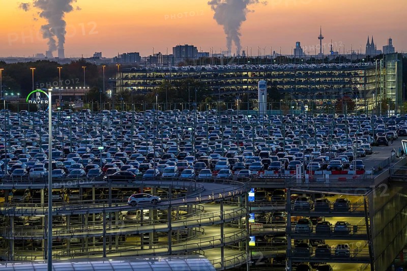 Full car park P2, at Cologne-Bonn Airport, behind car park P3 and the Cologne skyline, North Rhine-Westphalia, Germany, Europe