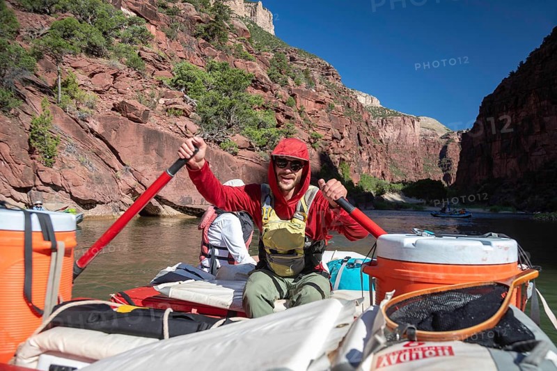 Dinosaur, Colorado, River rafters on the Green River in Dinosaur National Monument. Joey West, a guide for Holiday River Expeditions, rows his raft downstream