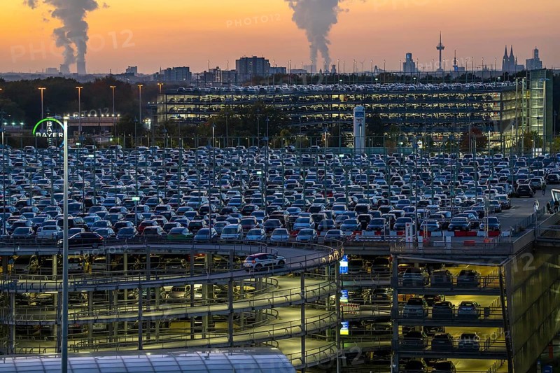 Full car park P2, at Cologne-Bonn Airport, behind car park P3 and the Cologne skyline, North Rhine-Westphalia, Germany, Europe