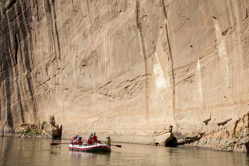 Dinosaur, Colorado, River rafters pass Steamboat Rock on the Green River in Dinosaur National Monument near the confluence with the Yampa River