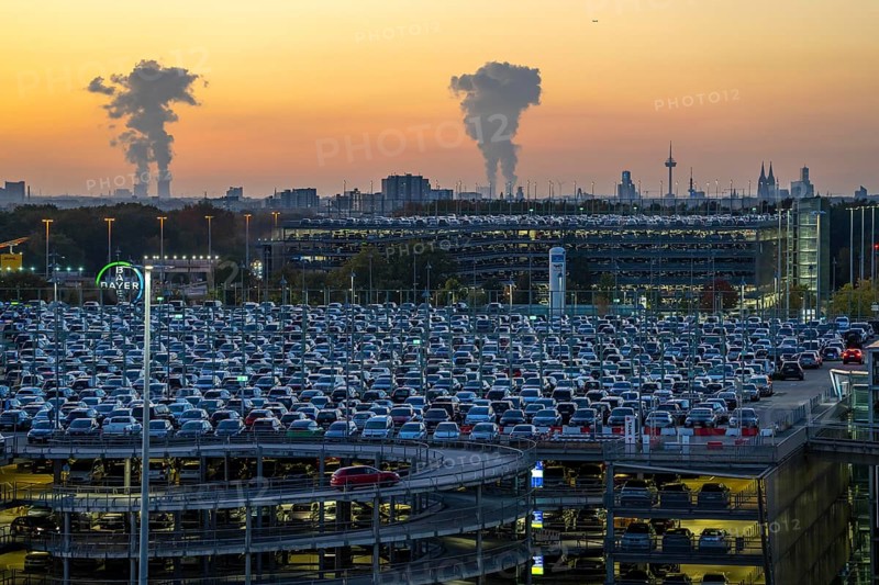 Full car park P2, at Cologne-Bonn Airport, behind car park P3 and the Cologne skyline, North Rhine-Westphalia, Germany, Europe