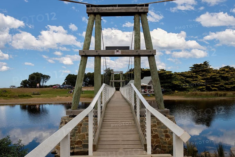 Spanning across the Erskine River, the Swing Bridge grants pedestrian access to the beach, Lorne, Victoria, Australia, Oceania