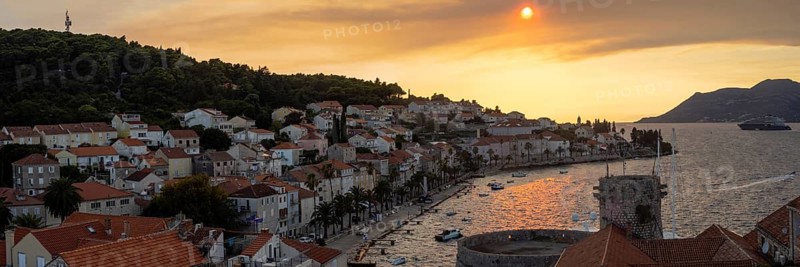 Cloudy mood at sunset by the sea, harbour of Korcula, panoramic shot, island of Korcula, Dalmatia, Croatia, Europe
