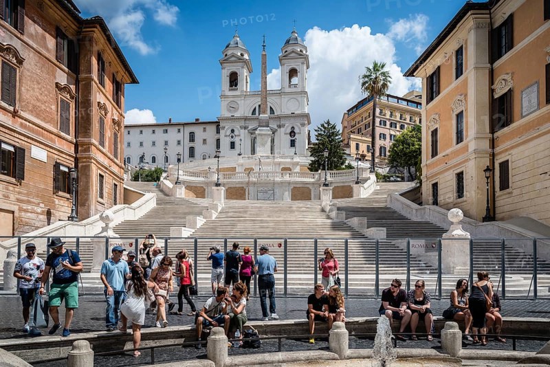 Rome, Italy, August 18, 2016: Piazza di Spagna and spanish steps to Piazza della Trinita dei Monti a sunny summer day. It is a main square in the historical centre of Rome, Europe