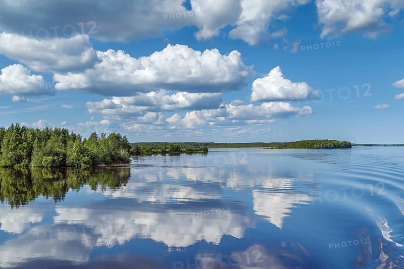 Landscape with a symmetrical reflection on the Vyg river (part of the White Sea-Baltic Canal), Russia, Europe