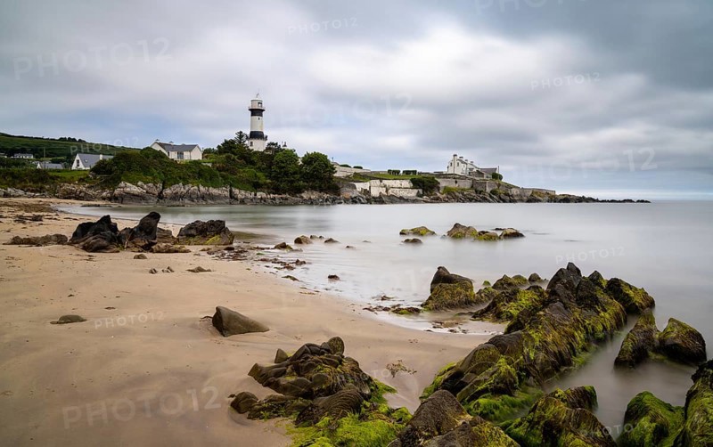 Stroove, Ireland, 9 July, 2022: view of the historic Stroove Lighthouse and beach on the Inishowen Peninsula on Ireland's Wild Atlantic Way scenic drive, Europe