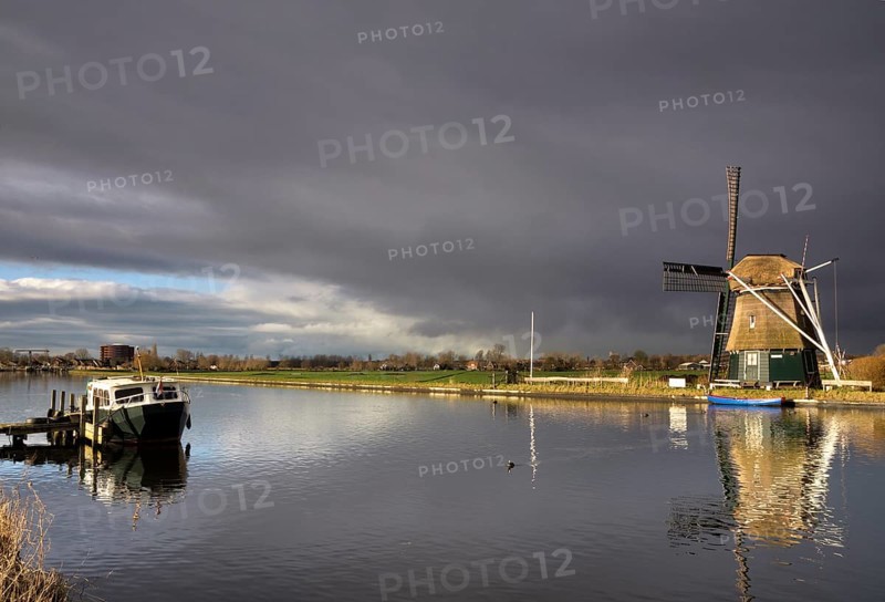 Windmill the Hommel just before a heavy shower