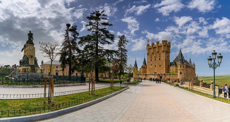 Segovia, Spain, 7 April, 2024: panorama of Segovia Castle and the Daoiz and Velarde Monument in the Reina Victoria Eugenia Square, Europe