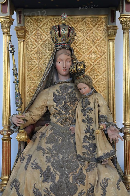 Parish church of St Magdalena, interior, Marian figure, Fürstenfeldbruck, Upper Bavaria, Bavaria, Germany, Holy Mother holding a child with crown and sceptre in front of a golden ornamental background, Europe