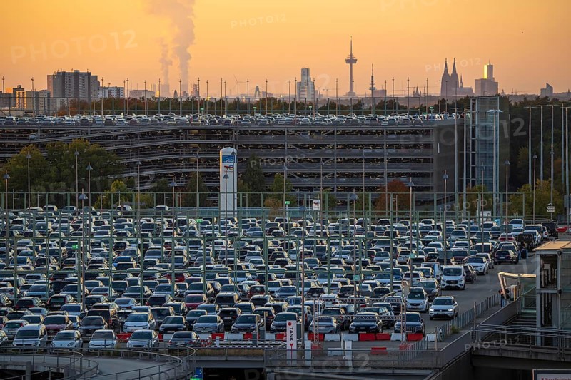 Full car park P2, at Cologne-Bonn Airport, behind car park P3 and the Cologne skyline, North Rhine-Westphalia, Germany, Europe