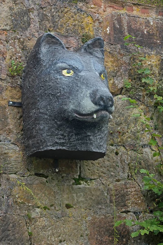 Sculptures by Pasquale Ippolito on the Brothers Grimm fairy tale The Wolf and the Seven Little Goats, wolf figure, wolf head, animal head, Grimm-Dich-Pfad, Marburg, Hesse, Germany, Europe