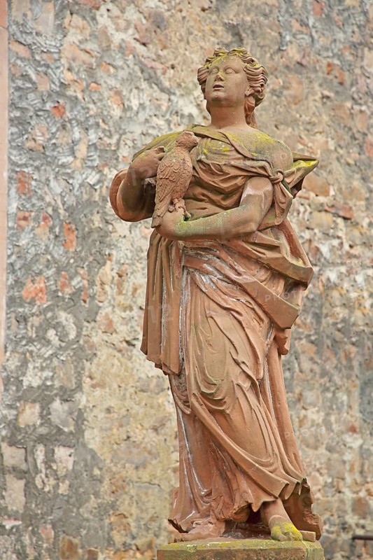 Sculpture by baroque Johann Friedrich Joseph Sommer sculptor on virtue : hope, female figure with falcon on arm, carrying, bird figure, allegory, virtues, Firmaneiplatz, Marburg, Hesse, Germany, Europe
