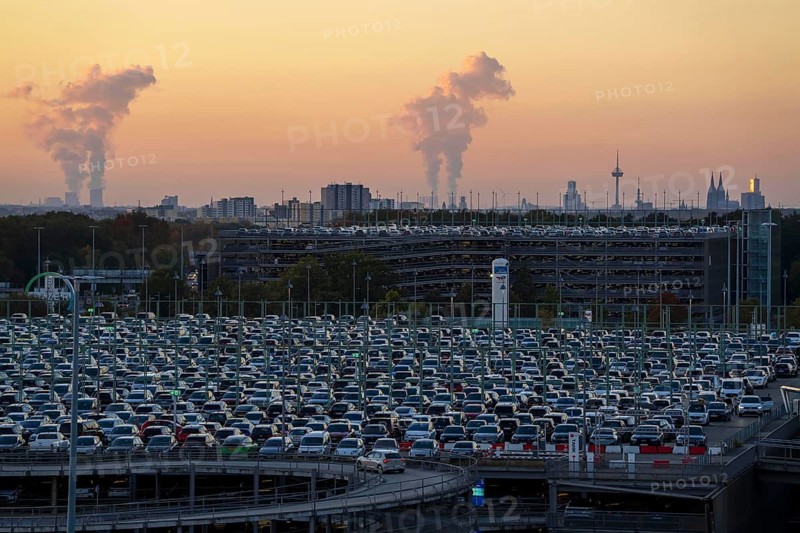 Full car park P2, at Cologne-Bonn Airport, behind car park P3 and the Cologne skyline, North Rhine-Westphalia, Germany, Europe