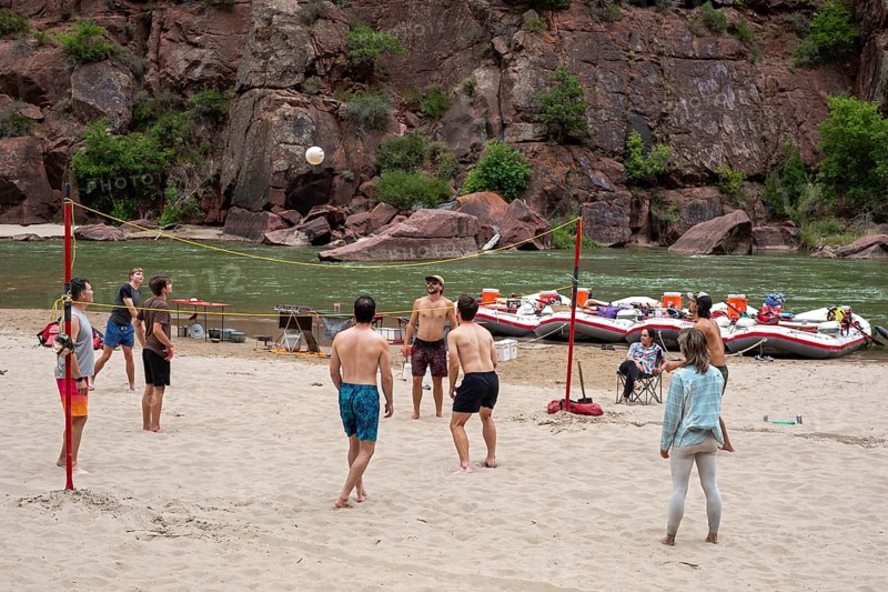 Dinosaur, Colorado, River rafters on the Green River in Dinosaur National Monument. Oars and ropes form the net for a volleyball game