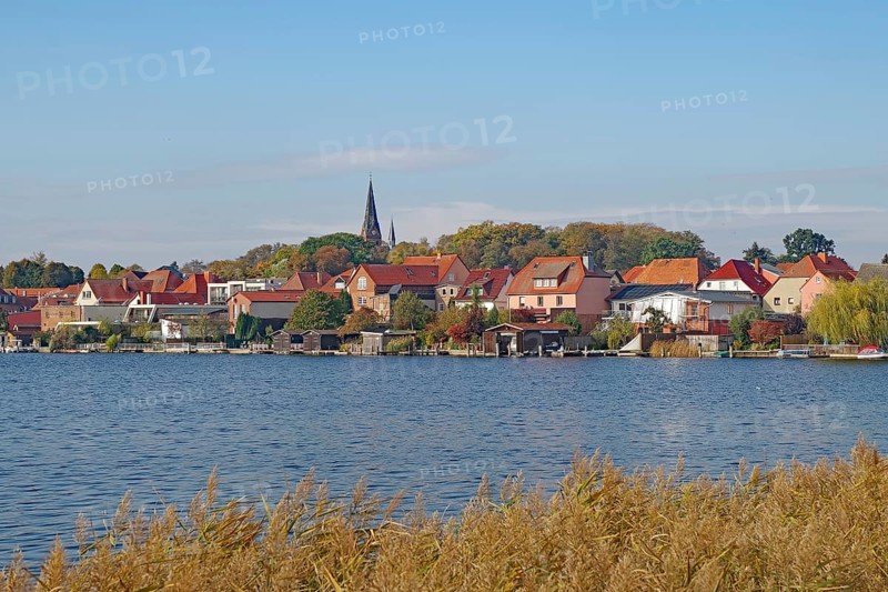 Picturesque town view at the lake with red roofs and nature, island town, Malchow, Mecklenburg-Vorpommern, Germany, Europe
