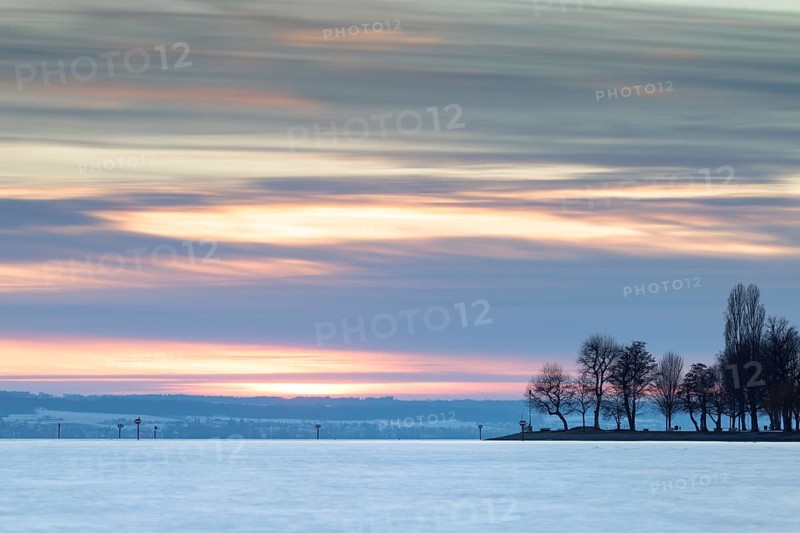A picturesque sunset over a lake with trees and a colourful sky, harbour, Immenstaad, Lake Constance, Baden-Württemberg, Germany, Europe