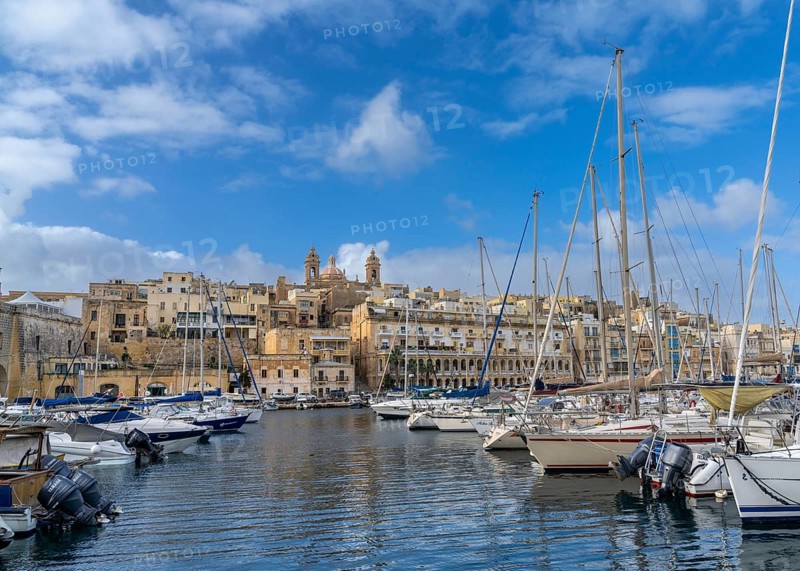 Valletta, Malta, 23 December, 2023: many boats in the Grand Harbor of Valletta with the city of Birgu in the background, Europe