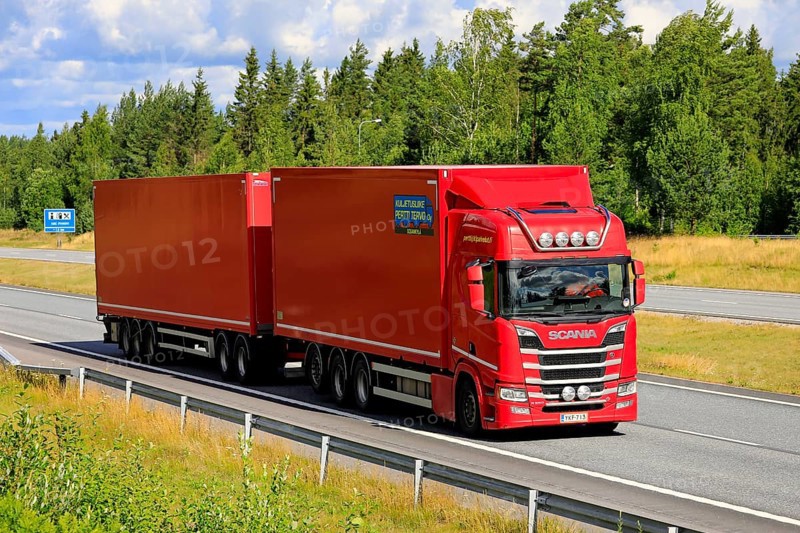 Red Scania R650 freight transport truck Kuljetusliike Pertti Tervo Oy from Sodankylä, north of Arctic circle on road in Salo, Finland. July 10, 20