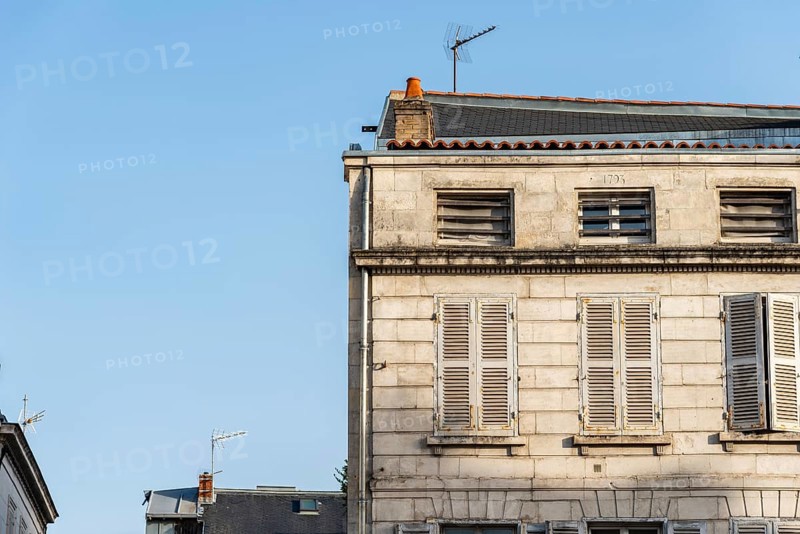 Decadent old residential buildings in the historic centre of La Rochelle, France, Europe