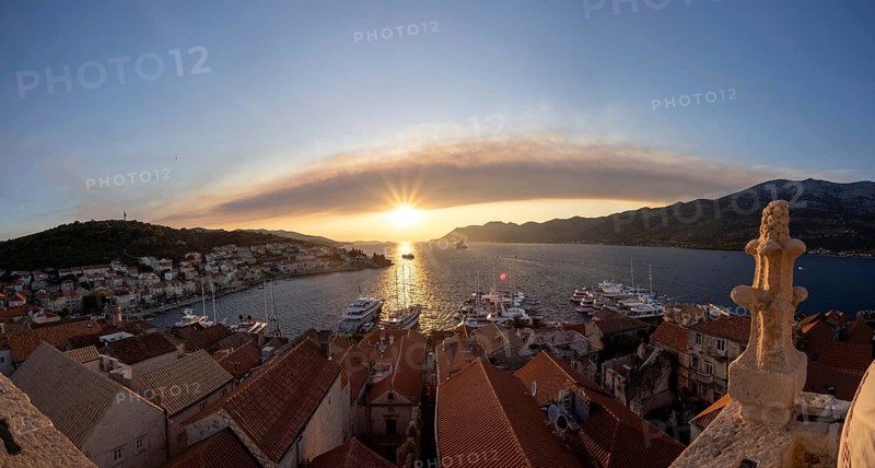Evening mood at sunset by the sea, view from the bell tower, ships in the harbour of Korcula, panoramic shot, island of Korcula, Dalmatia, Croatia, Europe