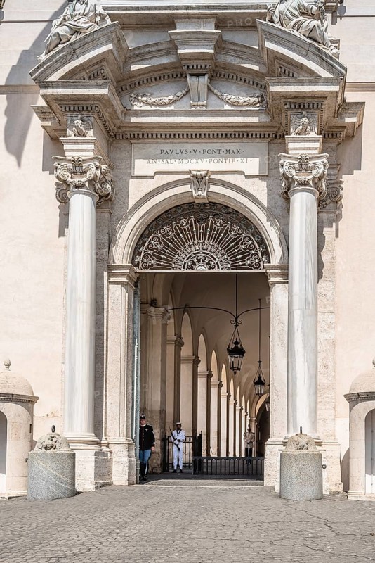 Rome, Italy, August 18, 2016: Soldiers guarding the door of The Quirinal Palace a sunny summer day. It is a historic building in Rome, official residence of the President of the Italian Republic, Europe