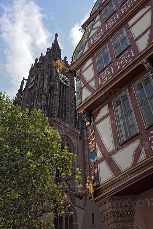 Corner detail of a colorful half timbered house, house to the Golden Libra, in the new historic old town of Frankfurt am Main, Germany, Europe
