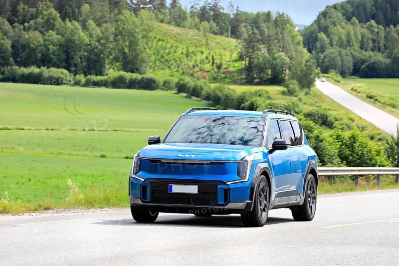 2024 blue Kia EV9 SUV car on road. Kia EV9 wins Red Dot Award: Product Design 2024 'Best of the Best' in Cars and Motorcycles categ. Salo, FI. 6-20-24