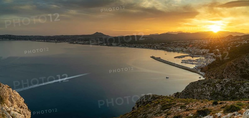 Panorama landscape view of Javea Bay and port in Alicante Province at sunset