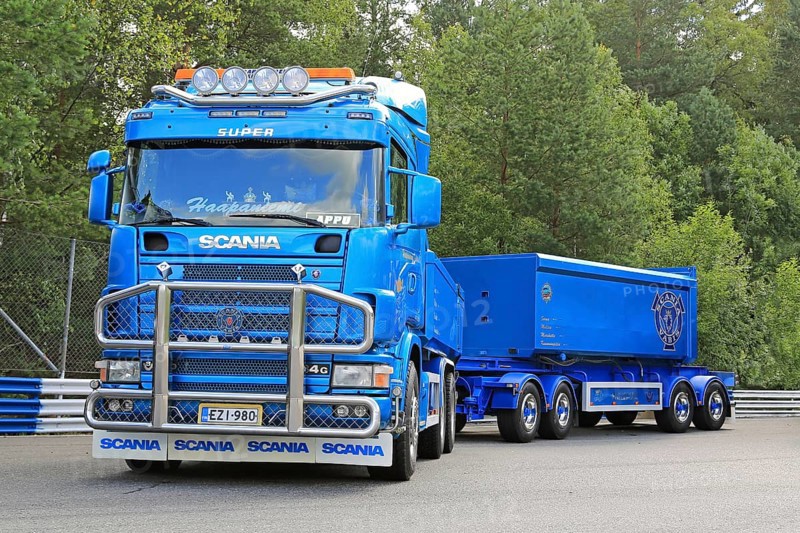 HAMEENLINNA, FINLAND, JULY 16, 2016: Blue Scania 164G V8 truck and gravel trailers for construction of Haanpaan Kuljetus Oy on the annual Tawastia Truck Weekend 2016