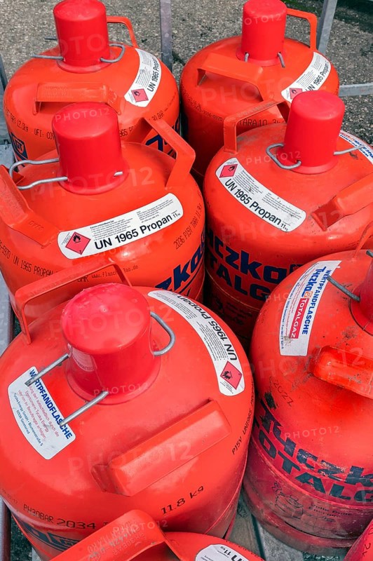 Red gas cylinders with propane gas, Allgäu, Bavaria, Germany, Europe
