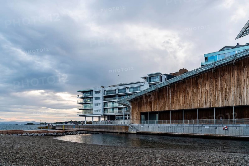 Oslo, Norway, August 11, 2019: Scenic view of sunset on Tjuvholmen quarter a new modern urban renewal with luxury housing in Central Oslo, Europe