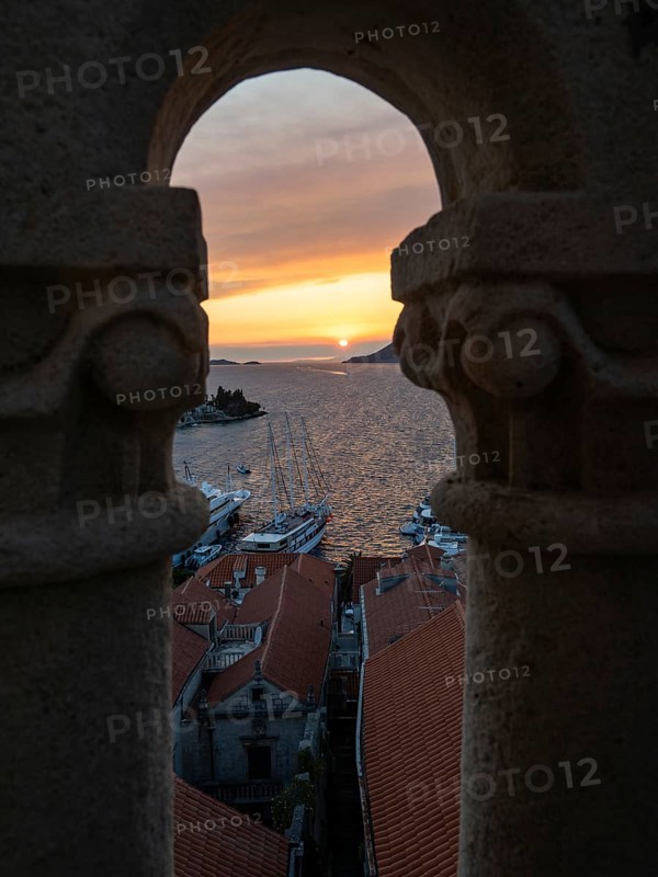 Cloudy mood at sunset by the sea, view from the bell tower, Korcula, Korcula Island, Dalmatia, Croatia, Europe