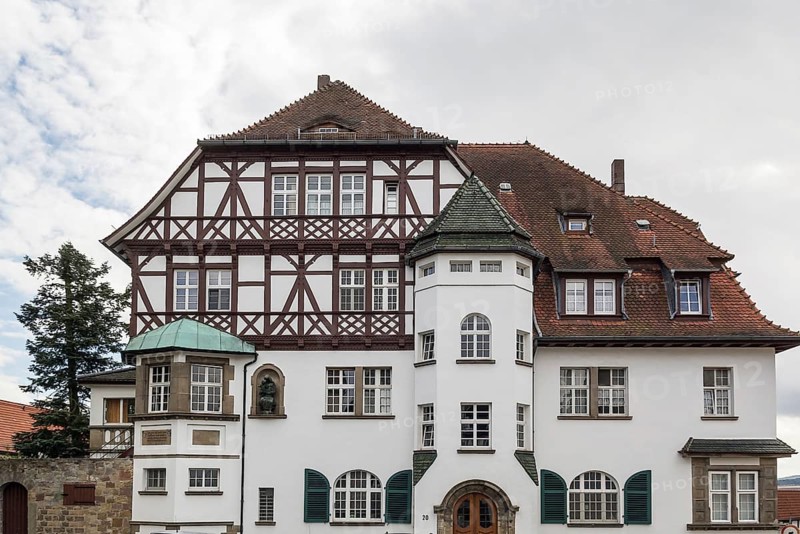 The street with picturesque ancient half-timbered houses in the Fritzlar city, Germany, Europe