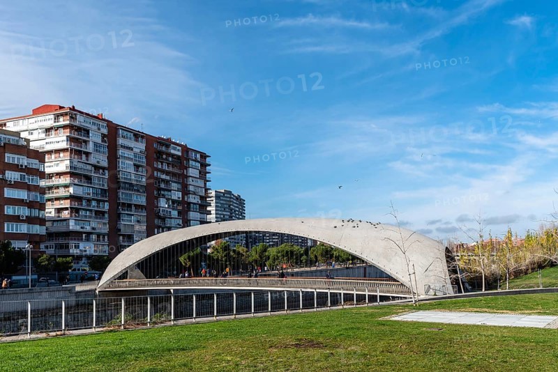 Madrid, Spain, December 9, 2019: Modern concrete bridge over Manzanares River in Madrid RIo area, Europe