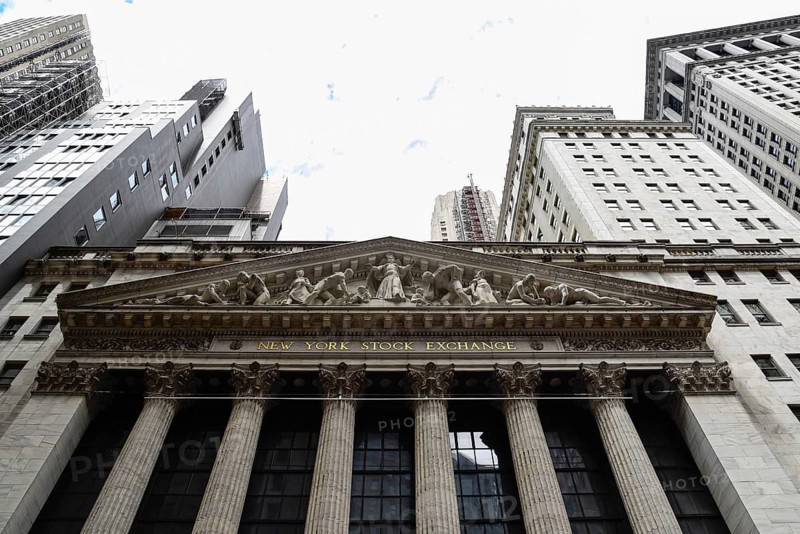 New York City, USA, June 20, 2018: Low angle view of New Stock Stock Exchange building. The New York Stock Exchange is an American stock exchange in the Financial District of Lower Manhattan. It is the largest stock exchange by market capitalization, North America