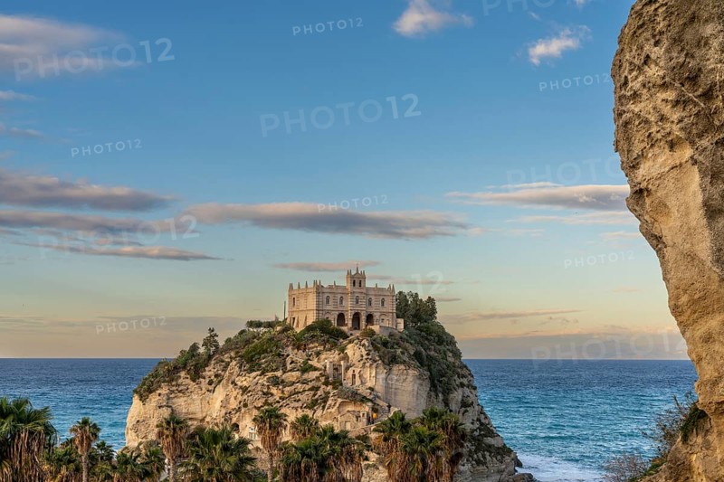 Tropea, Italy, 16 December, 2023: view of the Santa Maria dell'Isola Church on its rocky promontory in Tropea at sunset, Europe