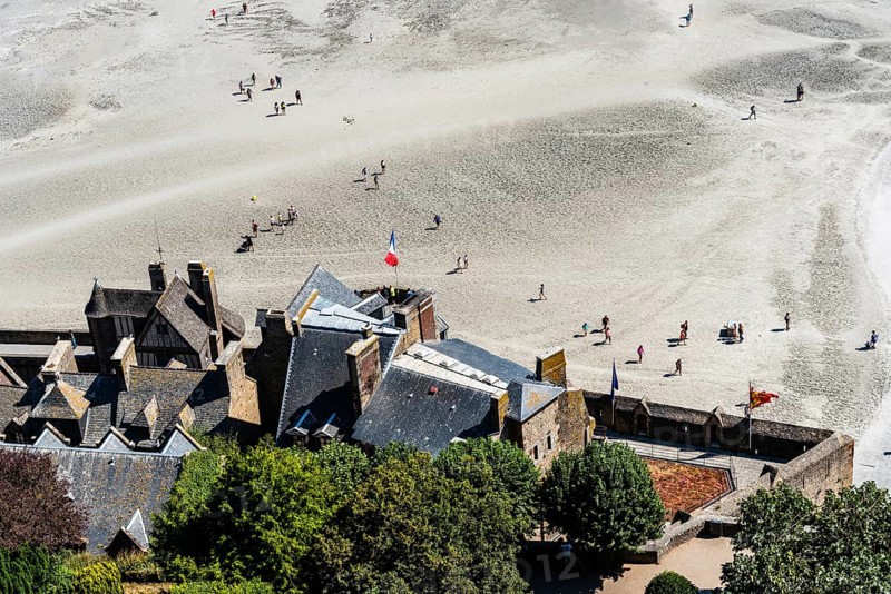 Mont Saint Michel, France, July 25, 2018: View of the bay of Mont Saint Michel from the ramparts at low tide, Europe