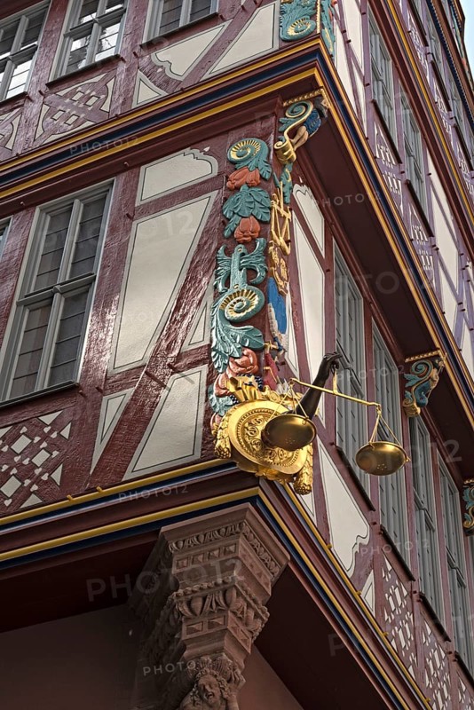 Corner detail of a colorful half timbered house, house to the Golden Libra, in the new historic old town of Frankfurt am Main, Germany, Europe