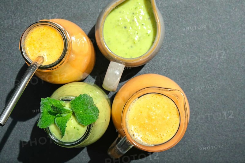 Seasonal Matcha green vegan smoothie with chia seeds and mint pumpkin carrot smoothie drink detox Breakfast. Clean eating, weight loss, healthy dieting food concept Fruit vegetable drink fitness