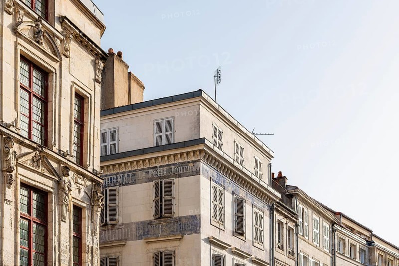 Decadent old residential buildings in the historic centre of La Rochelle, France, Europe