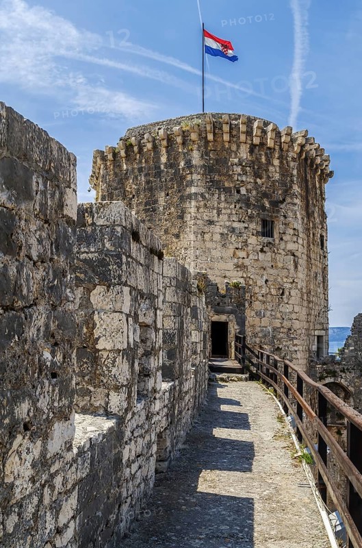 Kamerlengo is a castle and fortress in Trogir, Croatia. It was built by the Republic of Venice. View of tower from wall