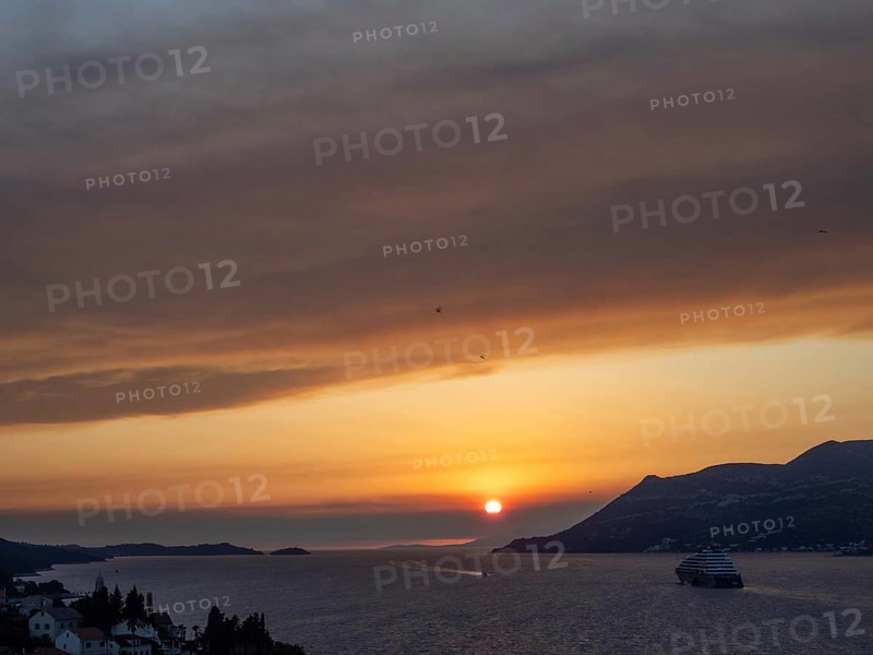 Evening atmosphere at sunset by the sea, view from the bell tower, cruise ship near Korcula, Korcula Island, Dalmatia, Croatia, Europe