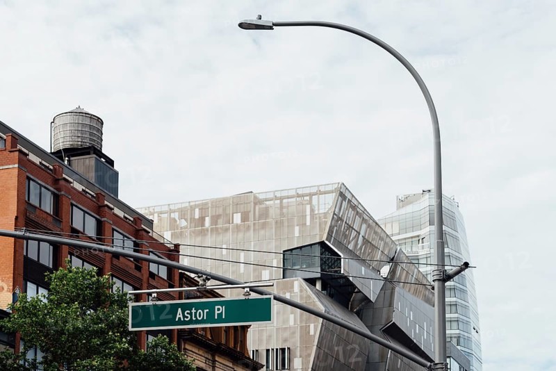 New York City, USA, June 20, 2018: Cityscape of Manhattan at Astor Place with Cooper Square building by Thom Mayne on background, North America
